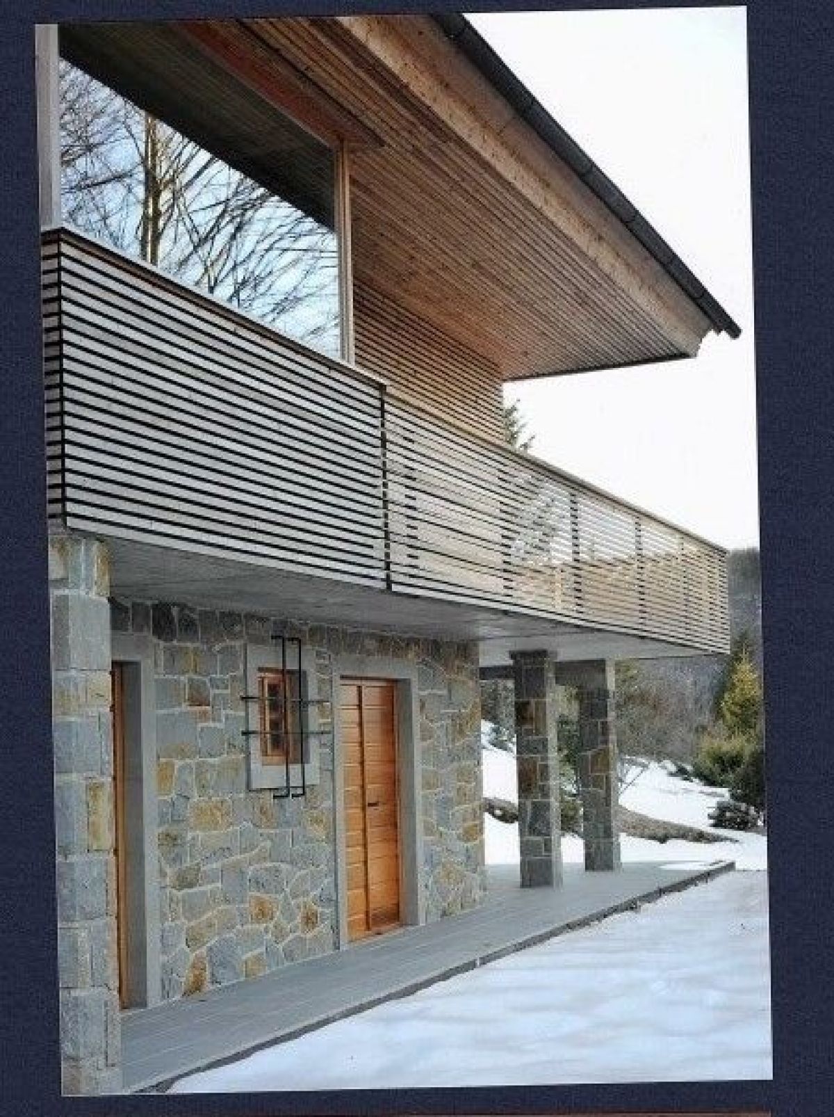 Case in legno RIKO-HISE srl - Arch. Daniele Bonzi Casa con facciate in Pietra  a due piani 